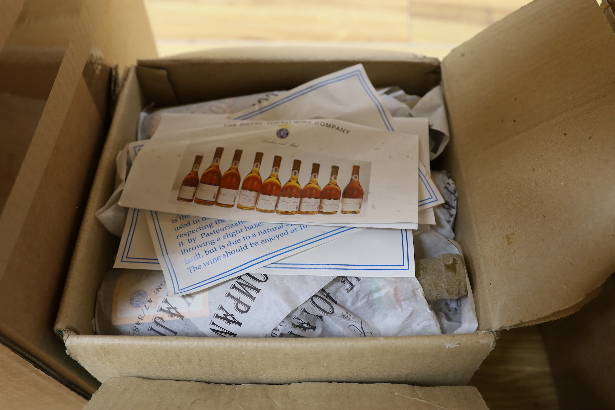 Two boxes of royal Tokaji dessert wine, eleven bottles in total.